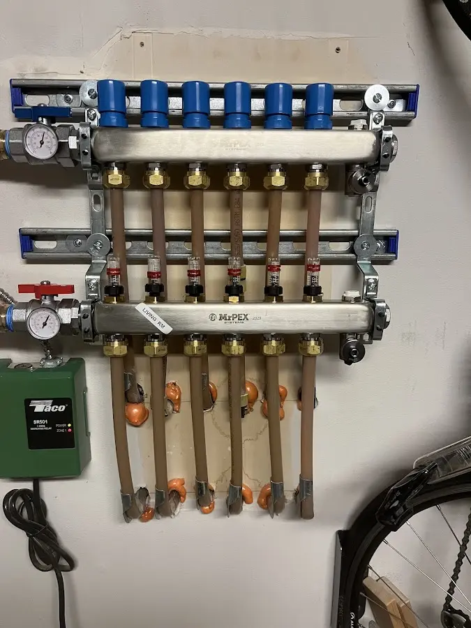 Plumber performing Water Heater Repair at a residential property in Fairchild AFB